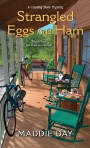 Strangled Eggs and Ham by Maddie Day. A cozy mystery novel with recipes.